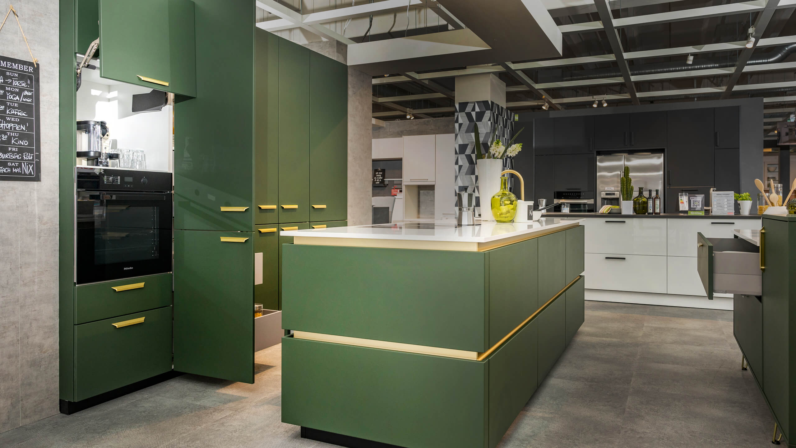 Grifflose Eyecatcherküche mit Insel "Siena" von Wert Küche