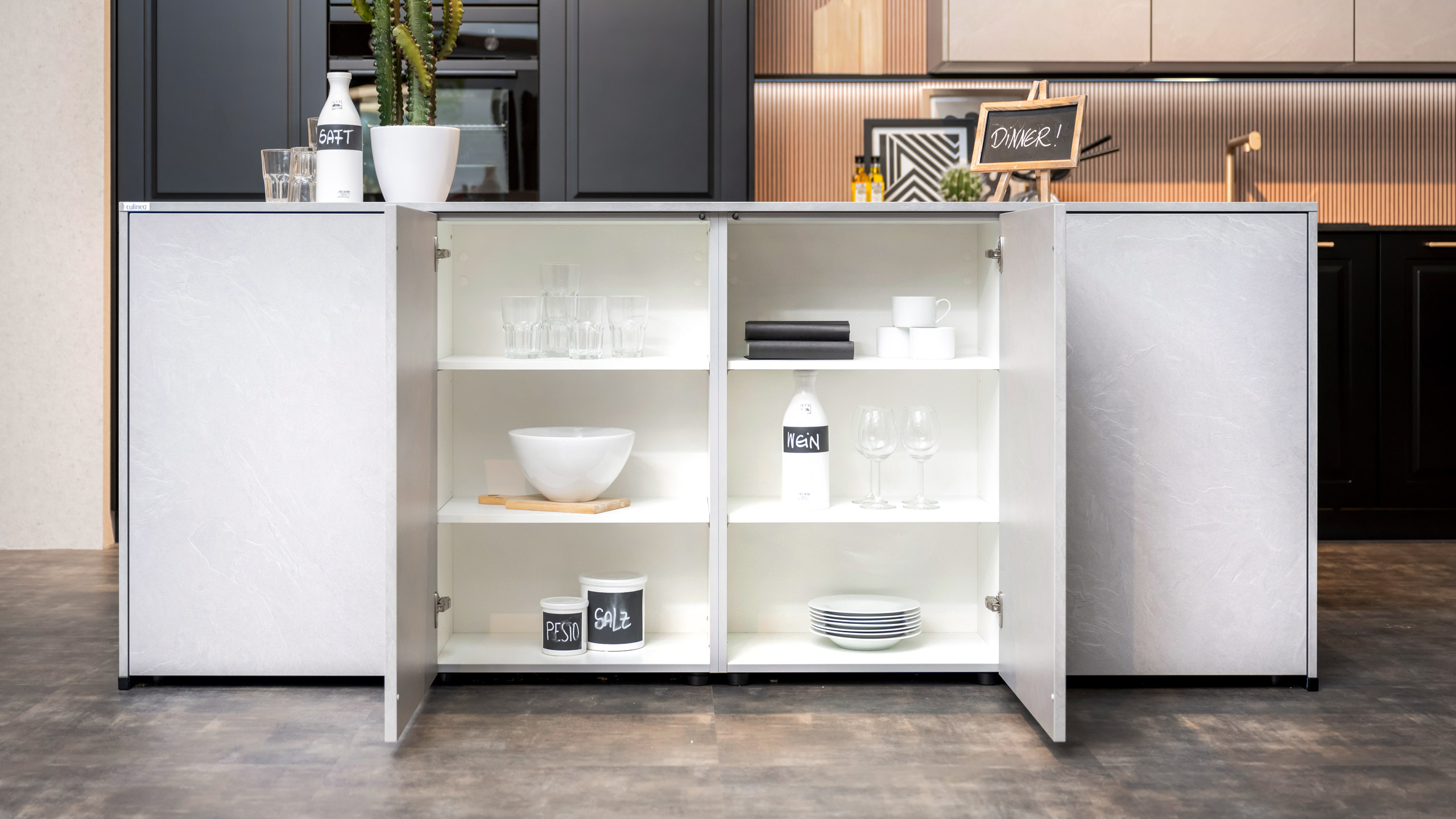 Moderne Inselküche im Stilmix "Sylt und StoneArt" von Culineo