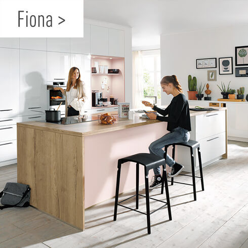 moebel-berning-lingen-rheine-osnabrueck-kuechen-marken-schueller-wert-kueche-fino-gloss-fiona-inselkueche-familien-trend-rosa-weiss.jpg