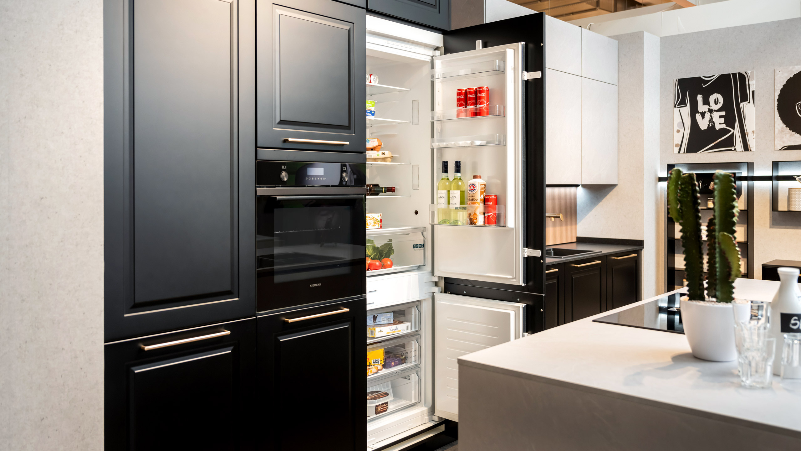 Moderne Inselküche im Stilmix "Sylt und StoneArt" von Culineo